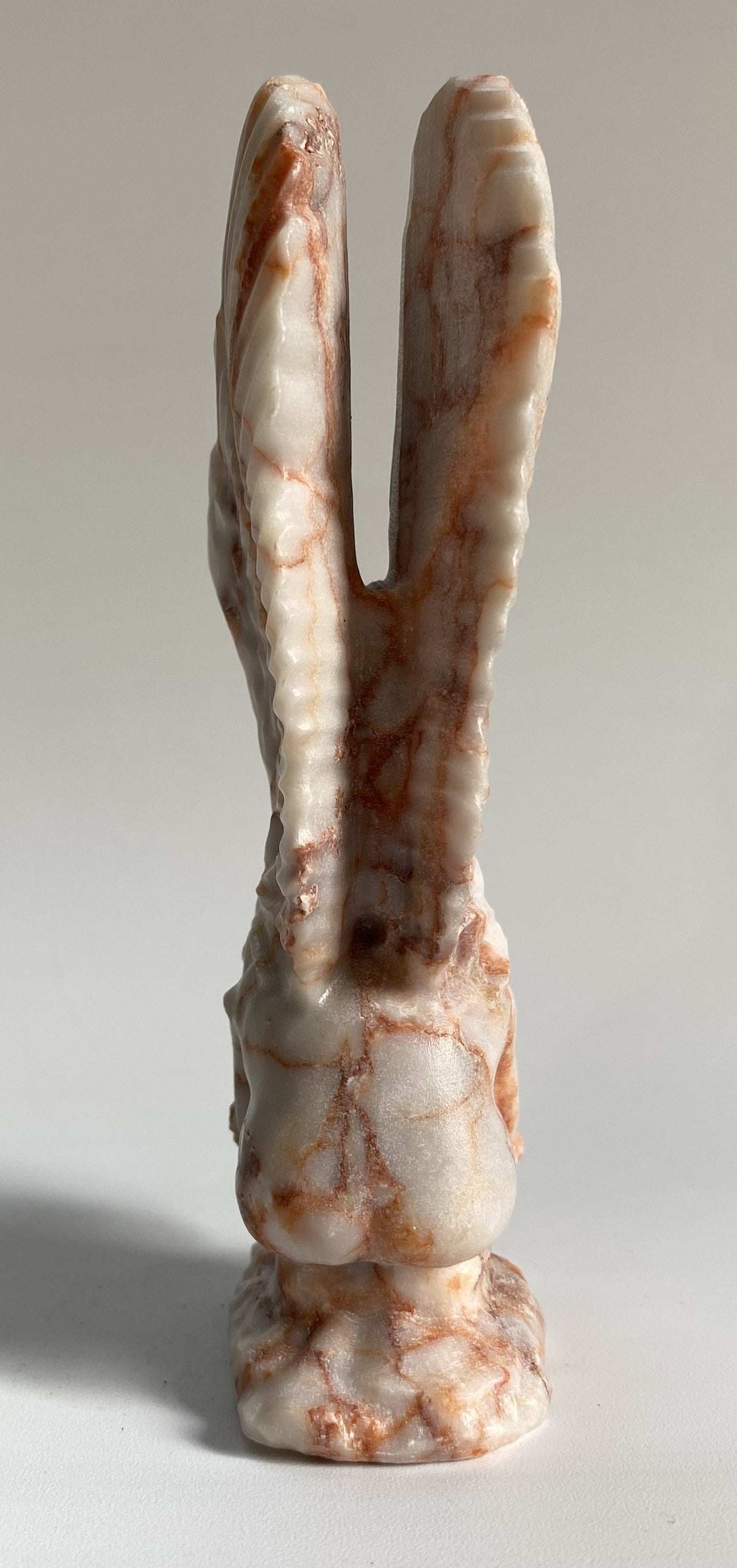 Carved Jasp Red Vein semi-precious stone angel figurine with two wings