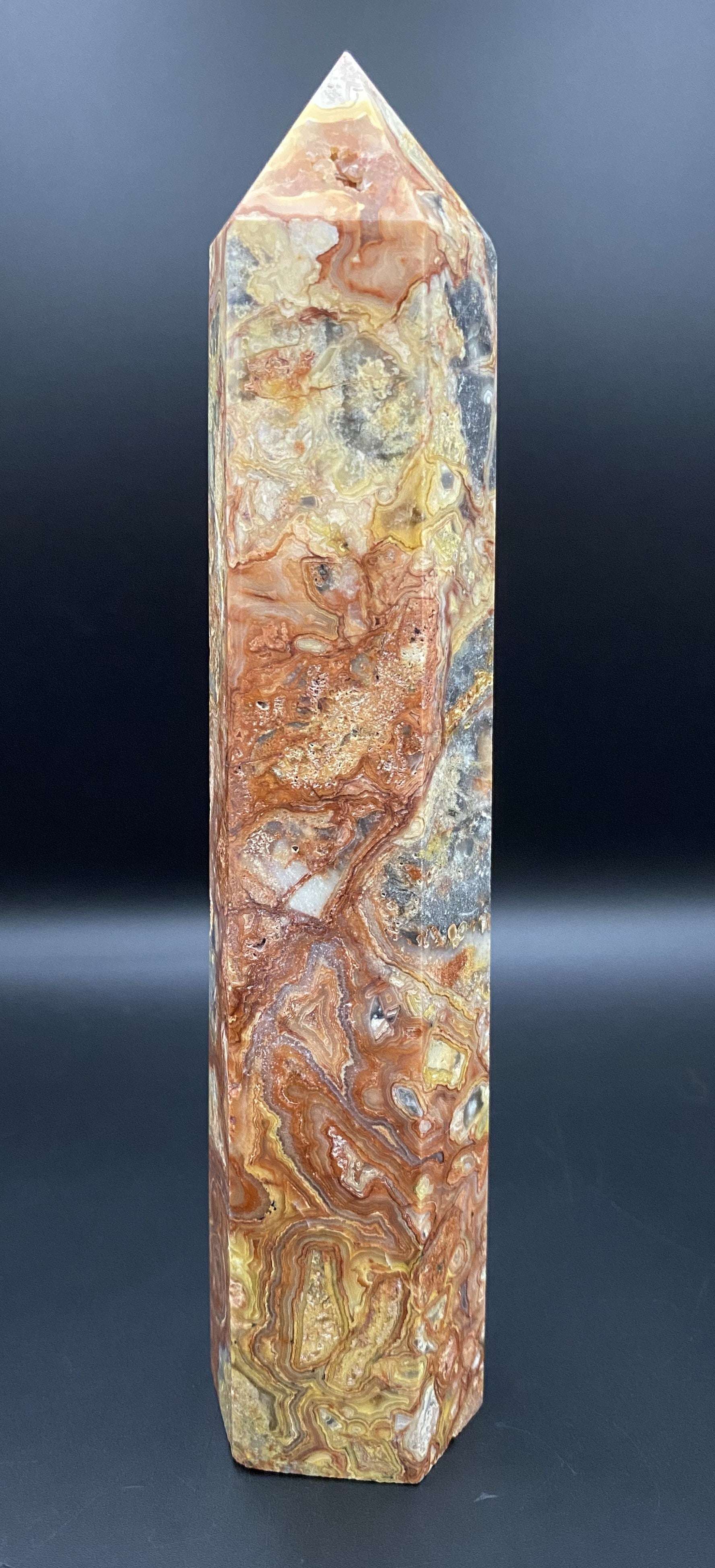 Obelisk made of Agat Crazy Lace semi-precious stone with intricate natural patterns