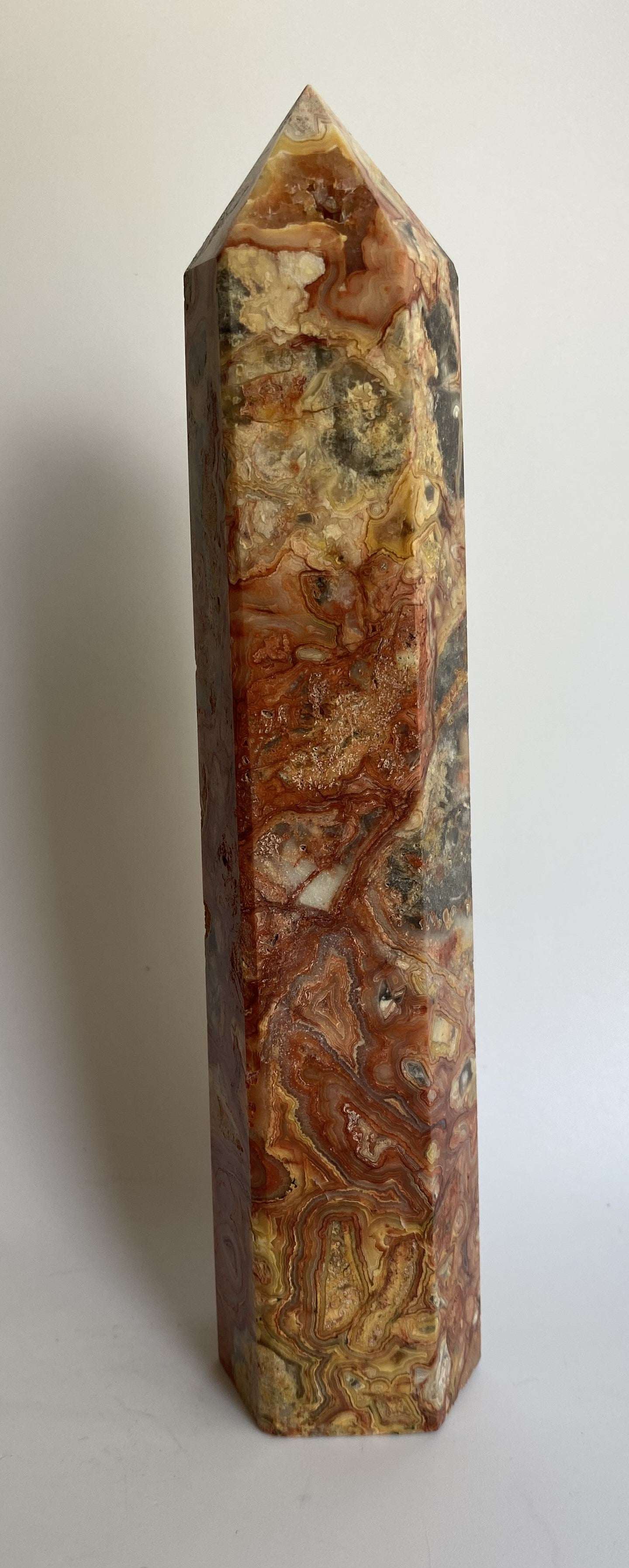 Obelisk made of Agat Crazy Lace stone with unique natural patterns