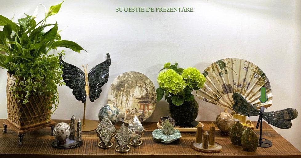 Dragonfly figure made of Agat Muschi stone with metal stand displayed on wooden surface with decorative plants and ornaments