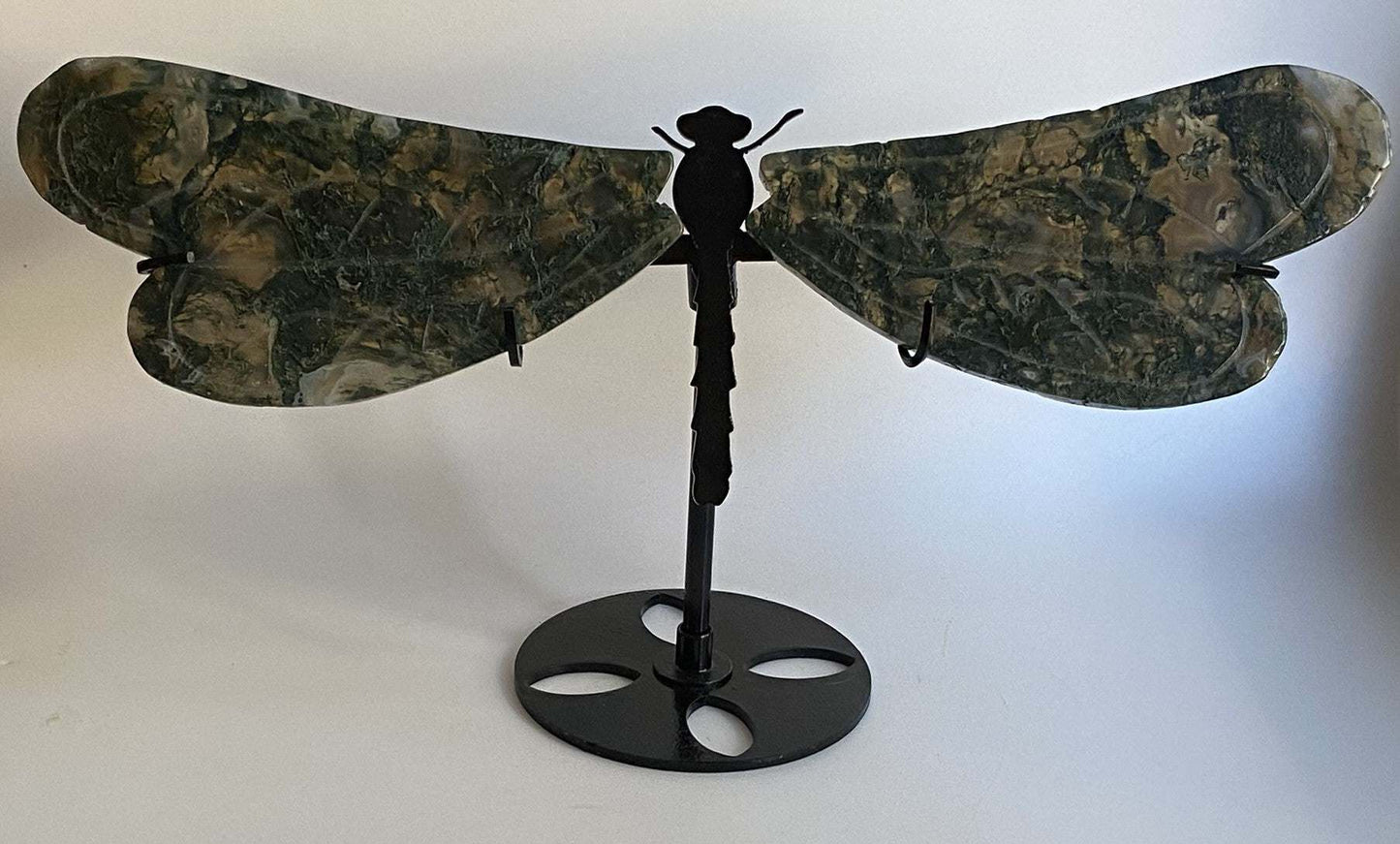 Dragonfly sculpture made from Agat Muschi stone on a metal stand