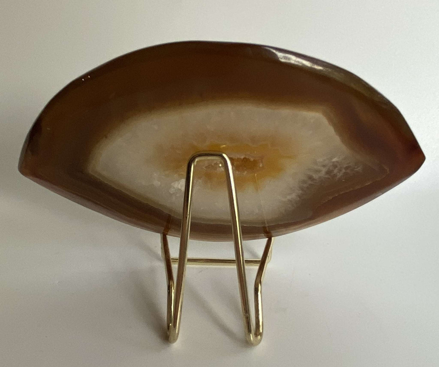 Natural agate slice on metal stand decorative stone display