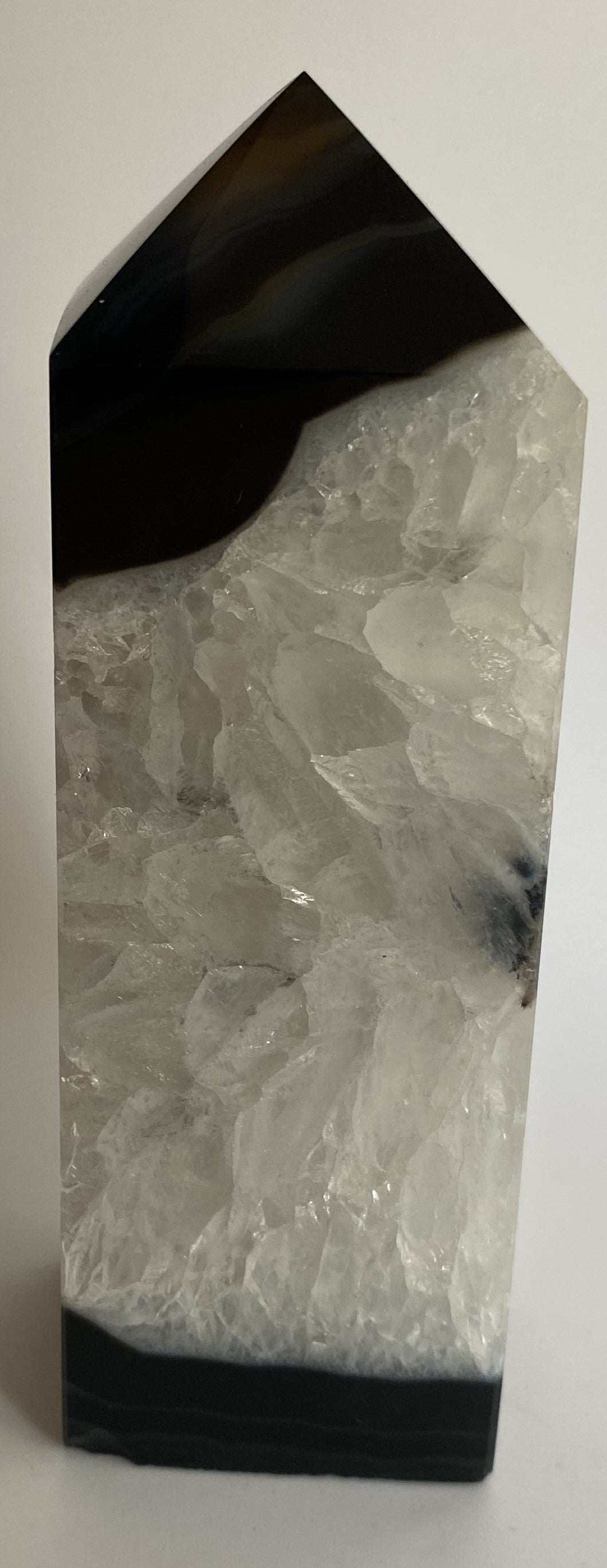 Obelisk black agate semi-precious stone with clear crystal texture