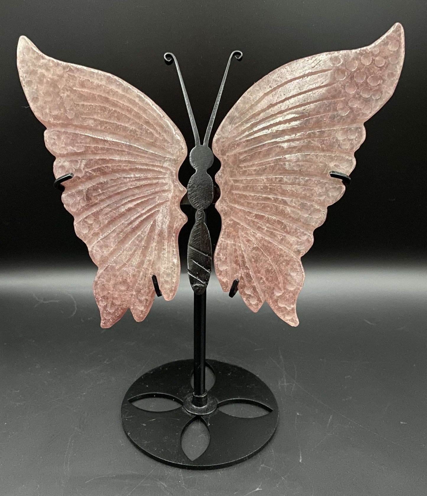 Cuart Capsuna butterfly gemstone on black metal stand