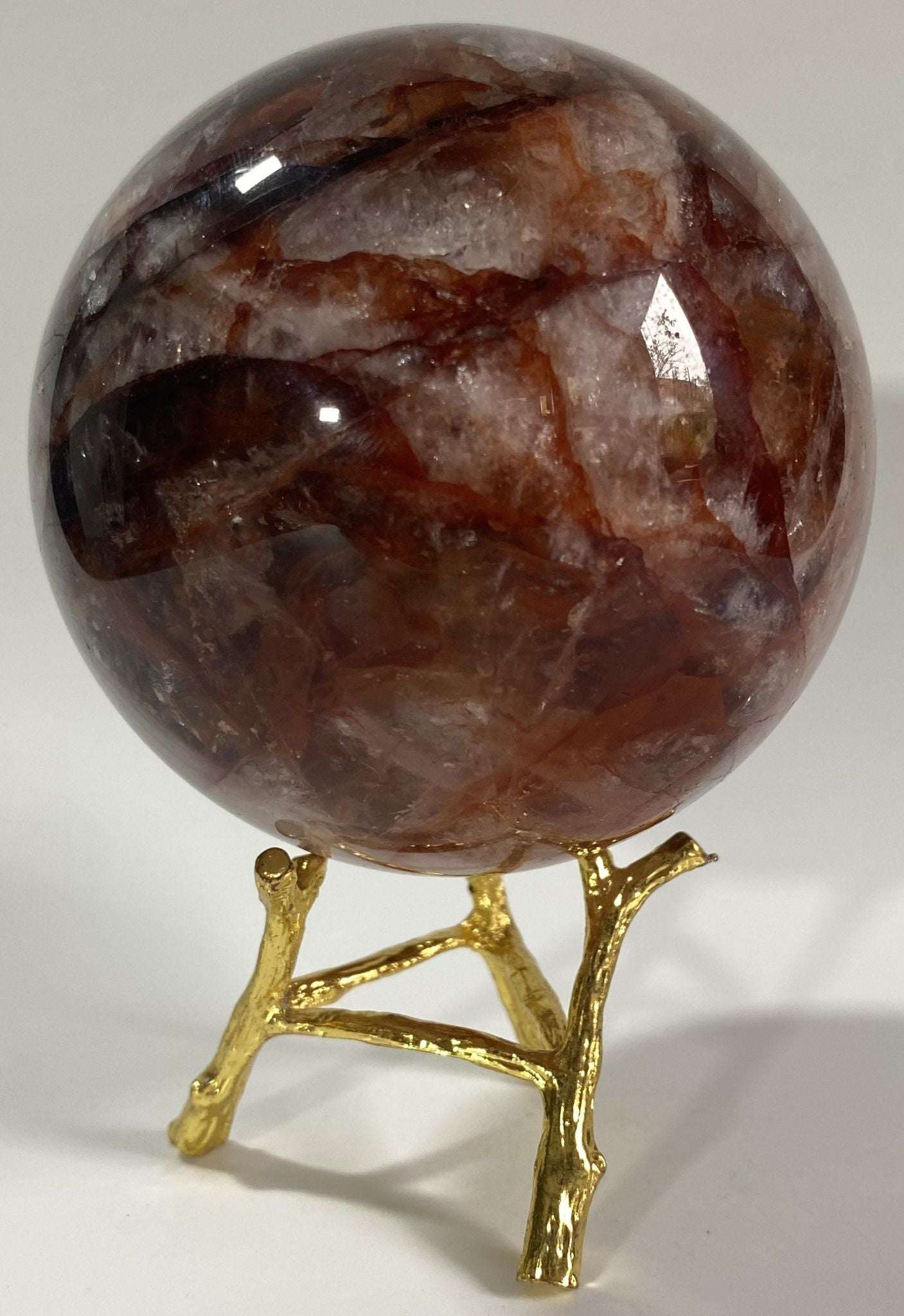 Sfera din Cuart Hematoid Rosu de 9.4cm pe suport metalic.