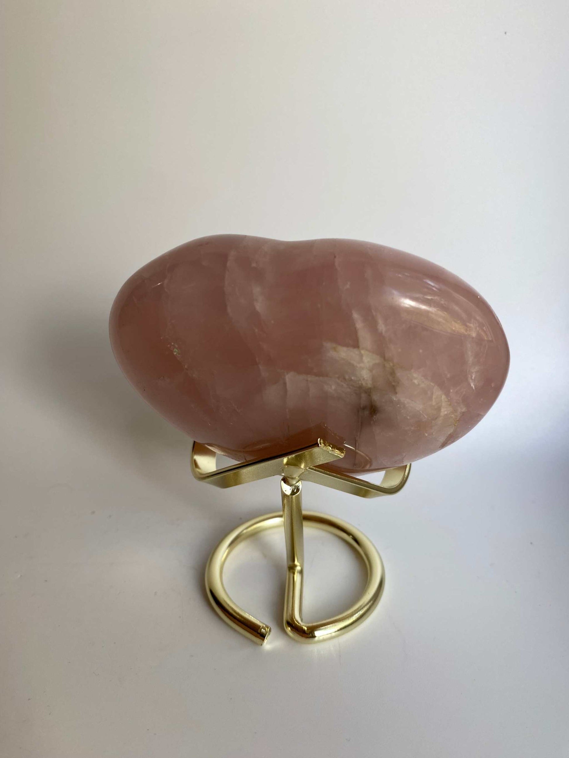 Cuart Roz heart-shaped semiprecious stone on metal stand
