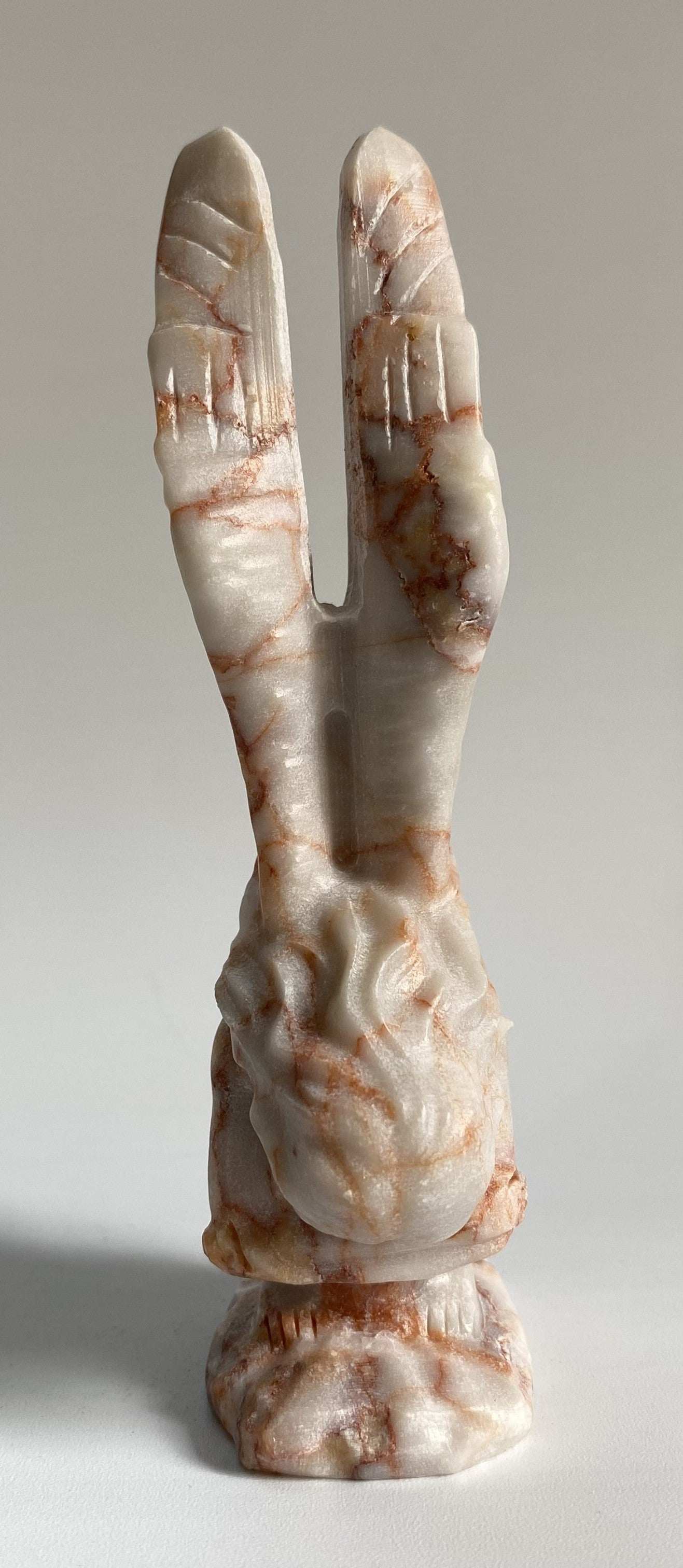 Sculpted angel figurine made from Jasp Red Vein semi-precious stone