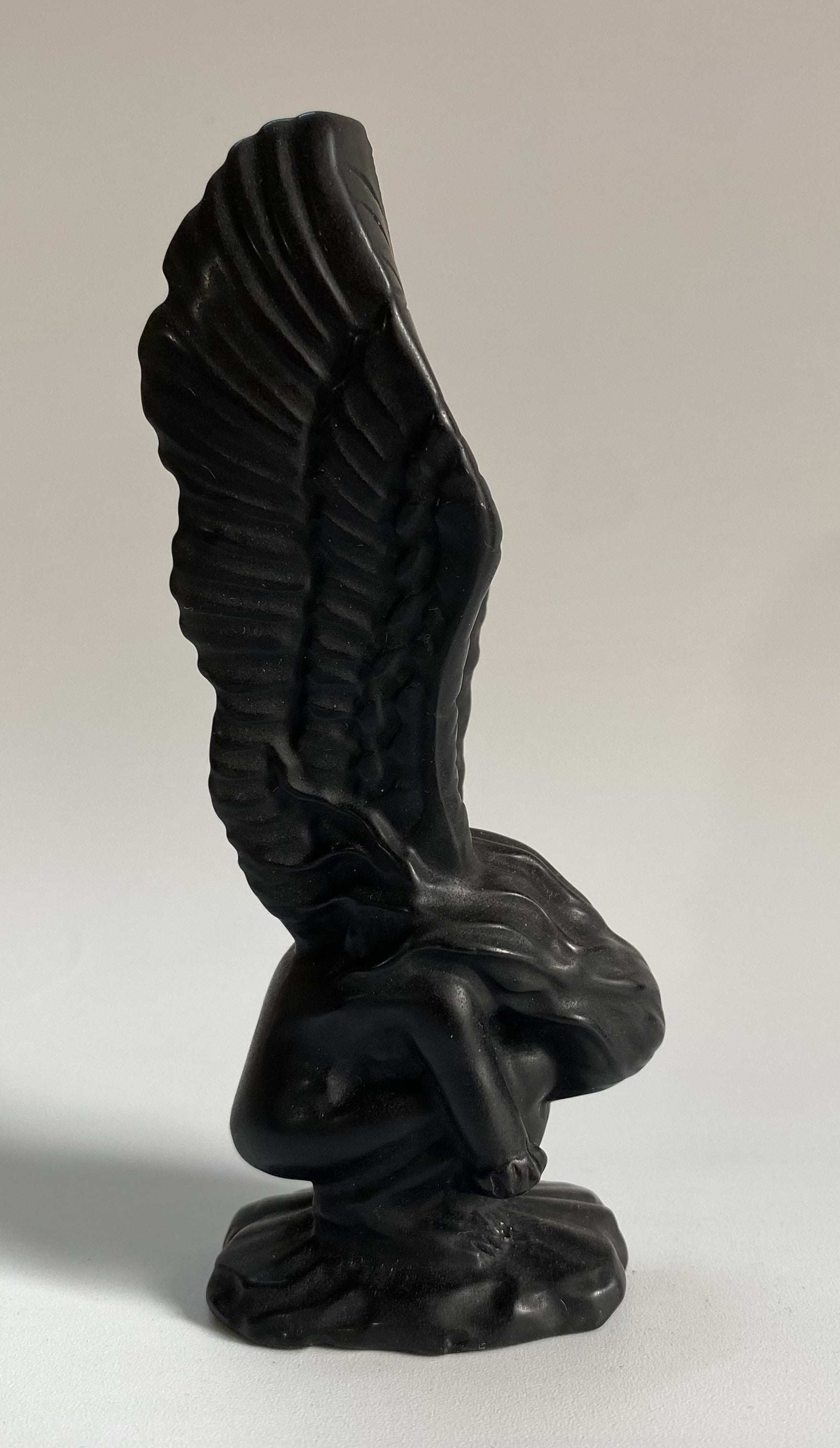 Obsidian black angel figurine carved from semiprecious stone