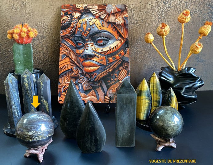 Colectie de minerale din ochi de tigru si obsidian cu tablou cu fata africana, ghiveci cu cactus si vaza cu flori uscate