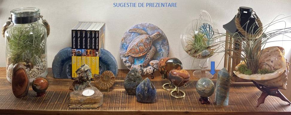 Blue Onix obelisk and sphere set with wooden sphere stand displayed on wooden shelf