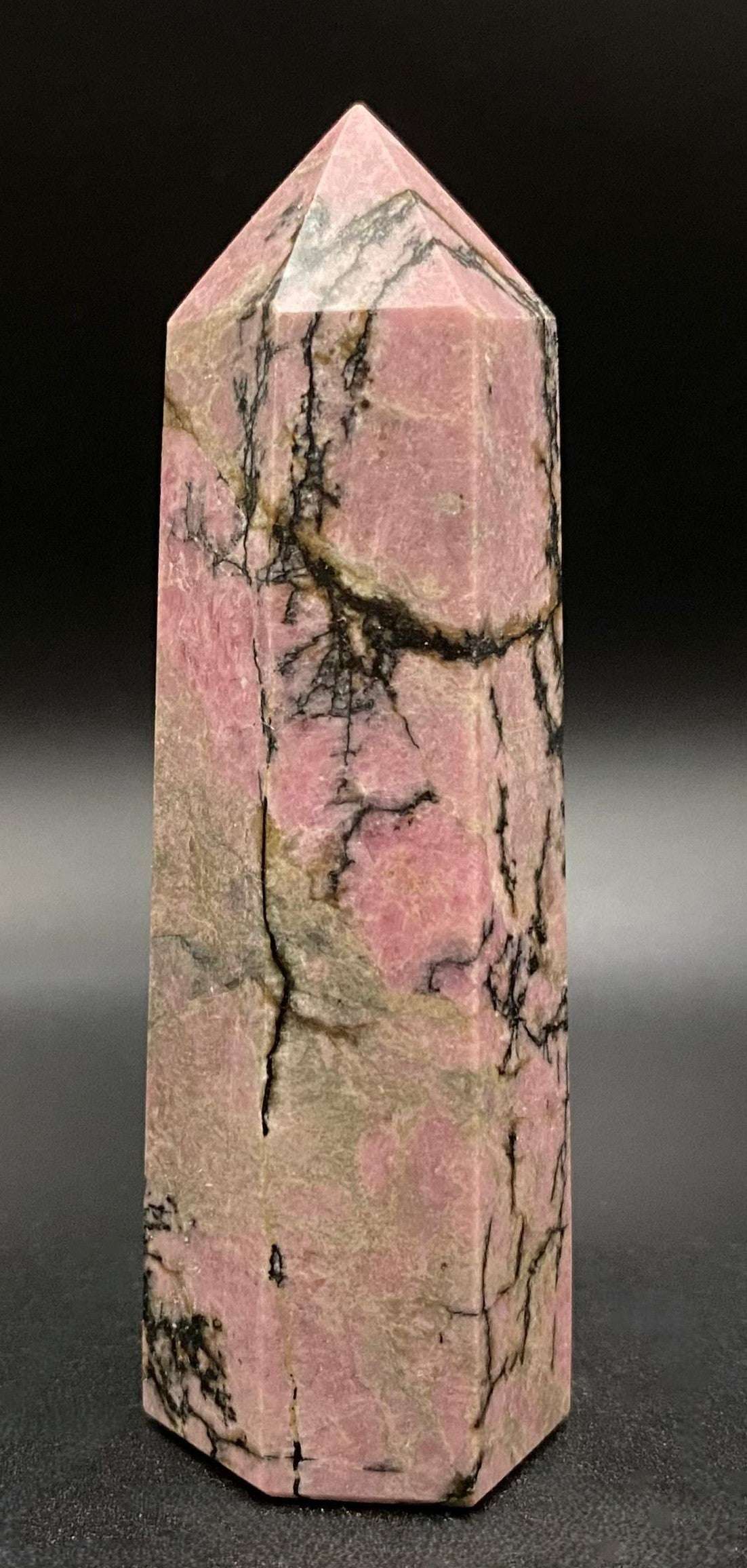 Rodonit obelisk semi-precious stone with pink and black patterns